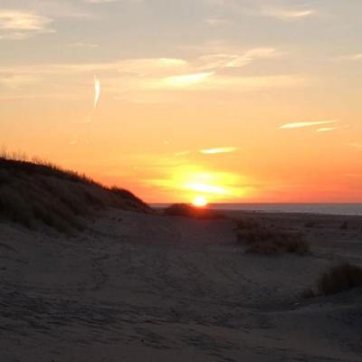 Ferienhaus Villa Seestern in Holland: Sonnenuntergang am Strand
